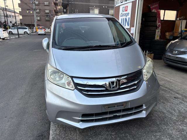 フリード G ジャストセレクション タイミングチェーン メモリーナビTV スマートキー 両側パワースライドドア リアカメラ HID ETC DVD CD AW(10枚目)