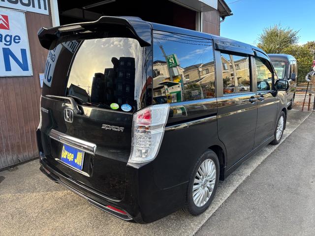 ステップワゴンスパーダ Ｚ　タイミングチェーン　ＨＤＤナビＴＶ　スマートキー　両側パワースライドドア　リアカメラ　ＨＩＤ　ＥＴＣ　ＤＶＤ　ＣＤ　ミュージックサーバー　リアモニター　ＡＷ（12枚目）