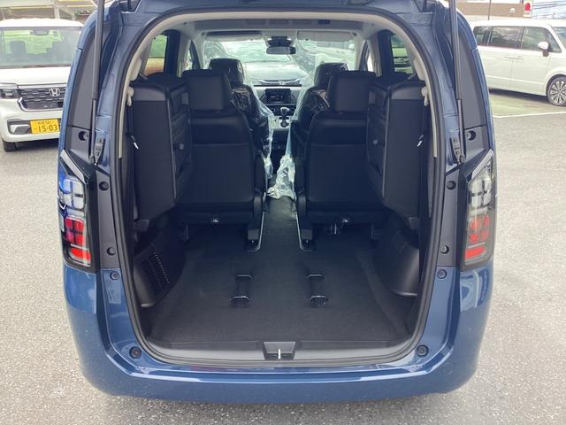 フリード e:HEVエアーEX /登録済未使用車/マルチビュカメラ/LEDアクティブコーナーリングライト/BSI/リヤクーラー/シートヒータ/純正アルミ/サイドカーテンSRS/プライムスムースコンビシート/オートリトラミラー/VSA(36枚目)