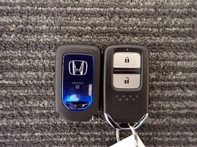 ヴェゼル ハイブリッドZ・ホンダセンシング /8インチナビ/前後ドラレコ/ワンオーナー/禁煙/パドルシフト/前席ハーフレザーシート/シートヒータ/サイドカーテンSRS/ルーフレール/ドアバイザー/HDMI/USB/フルセグ/録音再生機能/BTA(30枚目)