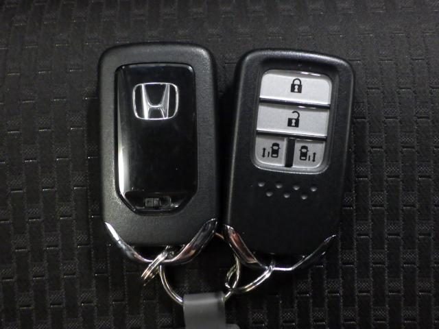 ステップワゴンスパーダ スパーダホンダセンシング /ワンオーナー/禁煙/後席モニター/10インチナビ/FABTECTシート/パドルシフト/ETC2.0/USB/シートバックテーブル/ロールサンシェード/USB/BTA/フルセグ/オートリトラミラー(24枚目)