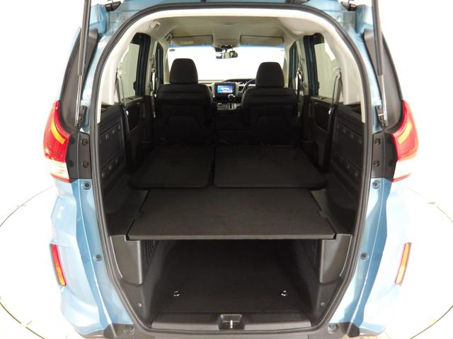 フリード＋ Ｇ・ホンダセンシング　／純正ナビ／ＬＥＤフォグ／オートライト／アクティブコーナーリングライト／プラズマクラスター／ワンオーナー／禁煙／合皮シート／革ハンドル／純正アルミ／ロールサンシェード／ＥＴＣ／ドアバイザー／ＢＴＡ（30枚目）