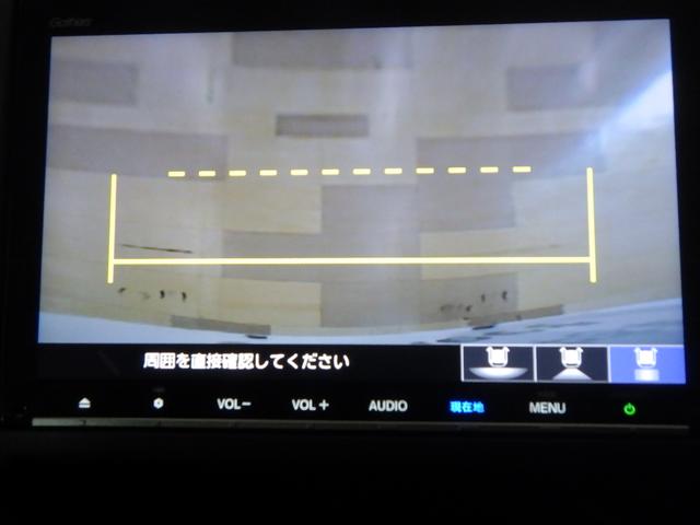 フリードハイブリッド ハイブリッド・Ｇホンダセンシング　／純正９インチナビ／１１．６インチ後席モニター／前後ドラレコ／シートヒータ／サイドカーテンＳＲＳ／ドアバイザー／ＬＥＤライト／アクティブコーナーリングライト／ワンオーナー／オートリトラミラー／ＨＤＭＩ（7枚目）