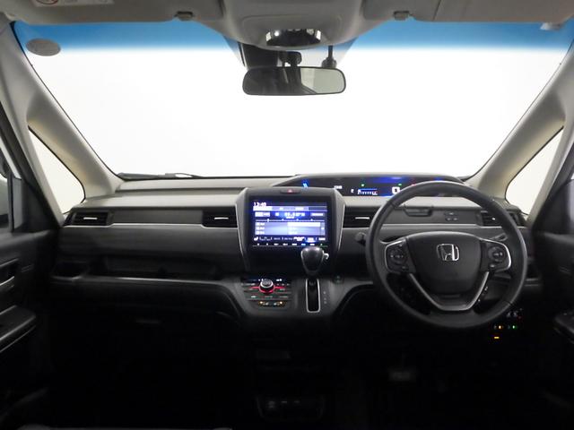 フリード Ｇ・ホンダセンシング　９インチナビ／１２インチ後席モニター／前後ドラレコ／シートヒータ／ＨＤＭＩ＆ＵＳＢ端子／プライムスムースコンビシート／ドアバイザー／プラズマクラスター／ＬＥＤアクティブコーナーリングライト／純正アルミ（12枚目）