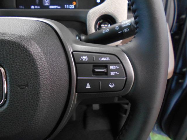 フリード エアーＥＸ　／ＢＳＩ／合皮コンビシート／リヤクーラー／サイドカーテンＳＲＳ／ブレーキホールド／シートヒータ／ＬＥＤライト／オートライト／オートハイビーム／ＡＣＣ／ＥＴＣ／オートリトラミラー／シートバックテーブル（9枚目）