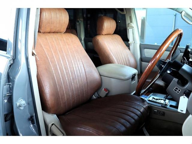 ランドクルーザー１００ ＶＸリミテッド　ＦＬＥＸオリジナルカスタム　Ｒｅｎｏｃａ１０６　角目フェイス　ムーンウォークグレー　リアゲートスムージング施工　ＤＥＡＮコロラドホイール　ＢＦＧタイヤ　パナソニック１０インチナビ　バックカメラ　ＥＴＣ（5枚目）