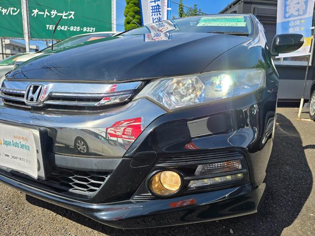 インサイトエクスクルーシブ ＸＬ　ＨＤＤインターナビ　フルセグテレビ　ＤＶＤ再生　バックカメラ　ＥＴＣ　ドライブレコーダー　レーダー探知機　革調シートカバー　ＨＩＤ　フォグ　本革ステアリング　クルーズコントロール　スマートキー（17枚目）
