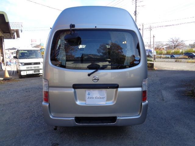 キャラバン 2400ccKA24ノンターボガソリンエンジン 10人乗り送迎車両 デュアルエアコン ABS リクライニングモケットシート カセット 時計 ホイールキャップ ハイルーフ ETC センタードアロック(7枚目)