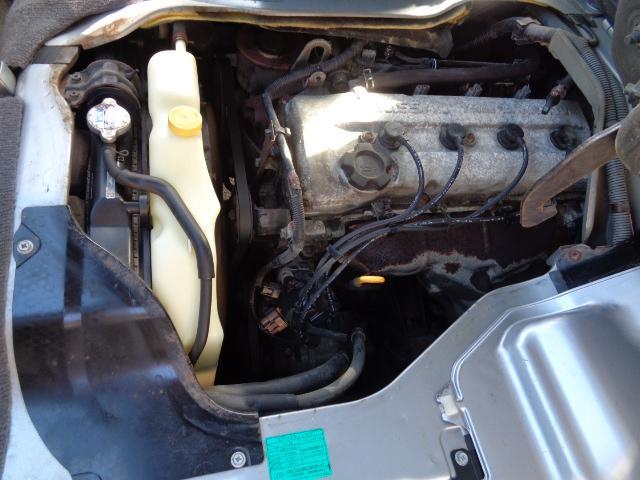 キャラバン 2400ccKA24ノンターボガソリンエンジン 10人乗り送迎車両 デュアルエアコン ABS リクライニングモケットシート カセット 時計 ホイールキャップ ハイルーフ ETC センタードアロック(64枚目)