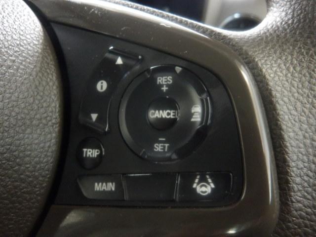 Ｎ－ＷＧＮ Ｌホンダセンシング　禁煙　４ＷＤ　ナビ　リアカメラ　ＥＴＣ　スマートキー　シートヒーター　ＣＤ　Ｂｌｕｅｔｏｏｔｈ　リアセンサー　誤発進抑制　パワーステアリング　オートクルーズ　ワンオーナー　Ｂカメラ　助手席エアバッグ（7枚目）