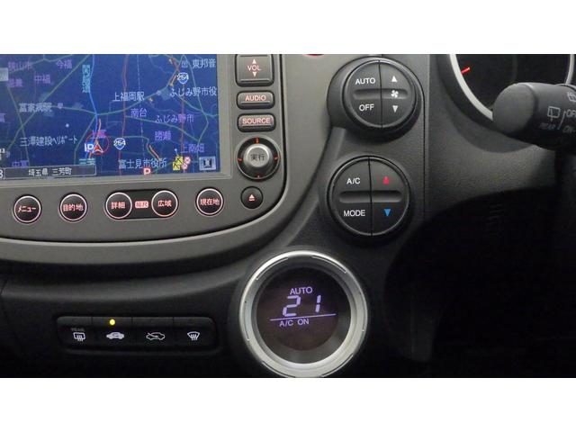 フィット Ｌ　禁煙車　ＤＶＤ再生　エアコン　キーレス　リアカメラ　ＥＴＣ付き　ＡＢＳ　ナビＴＶ　パワーウィンドウ　デュアルエアバック　パワーステアリング　ワンセグ　エアバック　ＨＤＤナビ（7枚目）