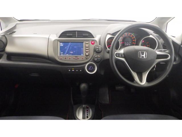 フィット Ｌ　禁煙車　ＤＶＤ再生　エアコン　キーレス　リアカメラ　ＥＴＣ付き　ＡＢＳ　ナビＴＶ　パワーウィンドウ　デュアルエアバック　パワーステアリング　ワンセグ　エアバック　ＨＤＤナビ（8枚目）