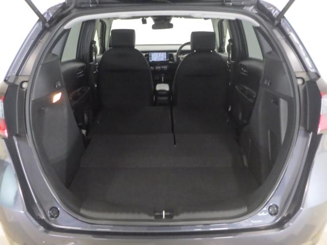 フィット ｅ：ＨＥＶホーム　禁煙車　前後誤発進抑制機能　クリソナ　助手席エアバッグ　運転席エアバッグ　アイドリングストップ　ＬＥＤライト　バックカメラ　ＡＢＳ　サイドエアバッグ　オートクルーズコントロール　フルセグＴＶ　記録簿（24枚目）