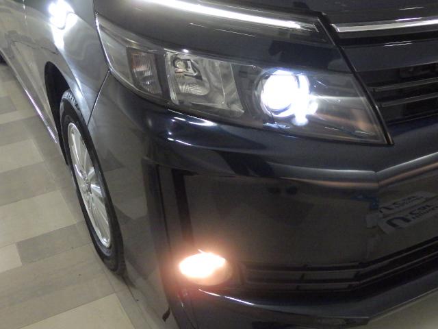 ヴォクシー ハイブリッドV 禁煙車 全方位カメラ 純9インチナビ リア席11インチモニター 左右パワスラ シートヒーター クルコン スマートエントリーシステム 全周囲カメラ スマートキープッシュスタート 盗難防止アラーム PS(32枚目)