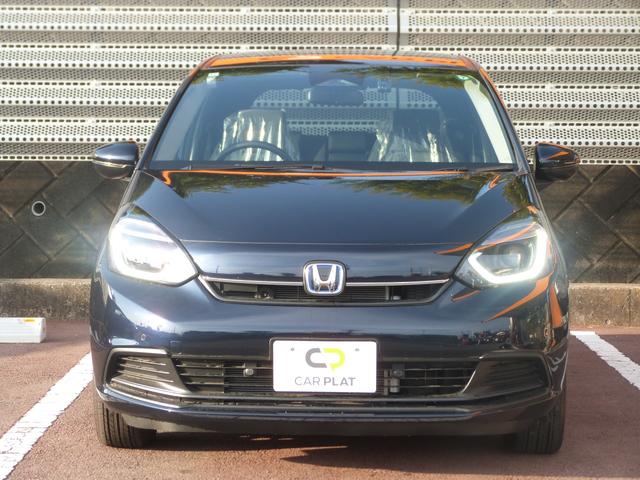 フィット e:HEVホーム 禁煙車 デモカー使用車 前ドラレコ ホンダセンシング ナビ リアカメラ スマートキー 前後誤発進抑制機能 助手席エアバッグ 運転席エアバッグ フルフラット ACC 車線維持支援システム 電格ミラー(8枚目)