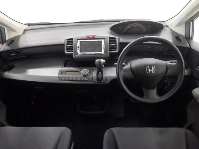 フリード Ｇジャストセレクション　禁煙車　ＳＳＤナビゲーション　リア左側パワースライドドア　ディスチャージヘッドライト　リアカメラ　ＤＶＤ／ＣＤ　ワンセグＴＶ　ＥＴＣ　Ｂモニター　定期点検記録簿　ワンオナ　助手席エアバッグ　１セグ（7枚目）