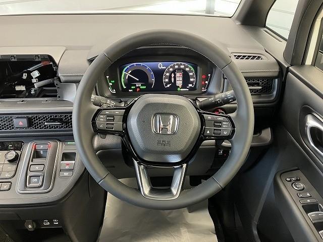 ステップワゴン ｅ：ＨＥＶスパーダ　バックカメラ　クリアランスソナー　オートクルーズコントロール　レーンアシスト　衝突被害軽減システム　両側電動スライドドア　オートライト　ＬＥＤヘッドランプ　電動リアゲート　スマートキー　電動格納ミラー（2枚目）