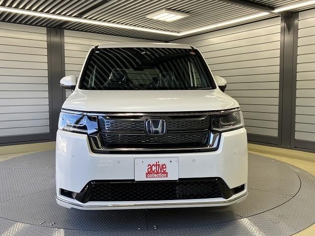 ステップワゴン ｅ：ＨＥＶスパーダ　バックカメラ　クリアランスソナー　オートクルーズコントロール　レーンアシスト　衝突被害軽減システム　両側電動スライドドア　オートライト　ＬＥＤヘッドランプ　電動リアゲート　スマートキー　電動格納ミラー（12枚目）