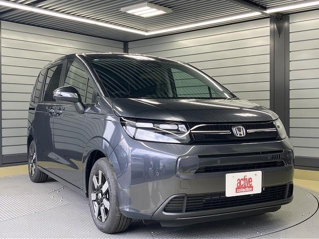 フリード エアー　ＥＸ　登録済未使用車　クリアランスソナー　オートクルーズコントロール　衝突被害軽減システム　両側電動スライドドア　オートライト　ＬＥＤヘッドランプ　スマートキー　電動格納ミラー　シートヒーター（13枚目）