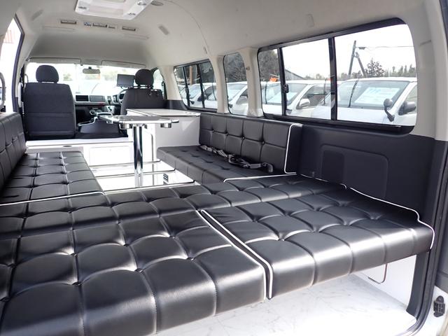 ハイエースワゴン トヨタ グランドキャビン キャンピング登録８ナンバー８人乗り車中泊ベッドキット ２２ｌ冷蔵庫 ２５ ｌｅｄ照明 床張り加工 禁煙 車 小窓付き ナビ ｔｖバックカメラｅｔｃキーレス １００ｖ電源 ３型 セカンドハウス製 千葉県 グランドキャビン