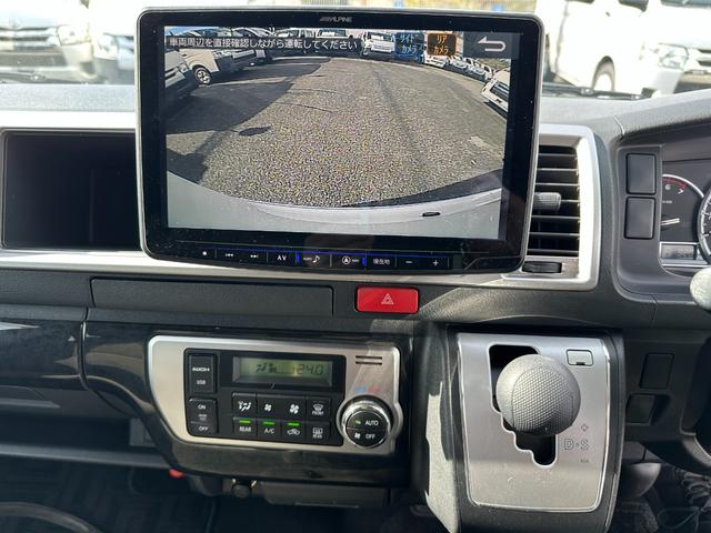 ハイエースワゴン GL 電動スライドドアプッシュスタートLEDヘッドライトアルパイン11インチナビ TVバックカメラETCスマートキーリヤモニター禁煙6速オートマFエアロフォグ100V電源タイベルチェーン(25枚目)