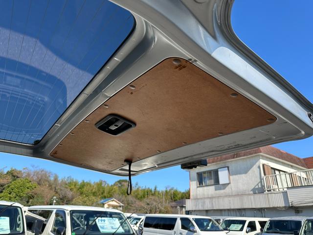 ハイエースバン ロングDX GLパッケージ 4WDディーゼルターボ9人リヤクーラーヒーターLEDヘッドライト純正ナビTVバックカメラETCWエアバック100V電源コーナーセンサー純正15インチAWタイミングベルト交換済みステッカー(35枚目)