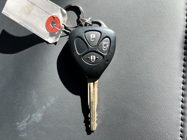 ハイエースワゴン グランドキャビン 純正ナビTVバックカメラETCキーレスリヤクーラーヒーター電動スライドドア電動格納ミラーシートカバーオートライトオートエアコンWエアバック(21枚目)