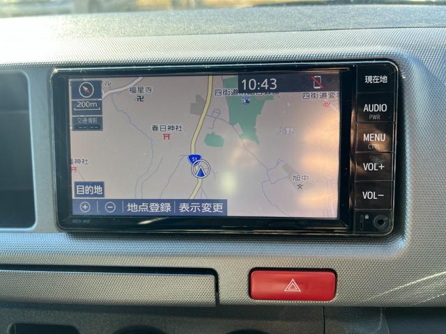 ハイエースワゴン グランドキャビン 純正ナビTVバックカメラETCキーレスリヤクーラーヒーター電動スライドドア電動格納ミラーシートカバーオートライトオートエアコンWエアバック(23枚目)