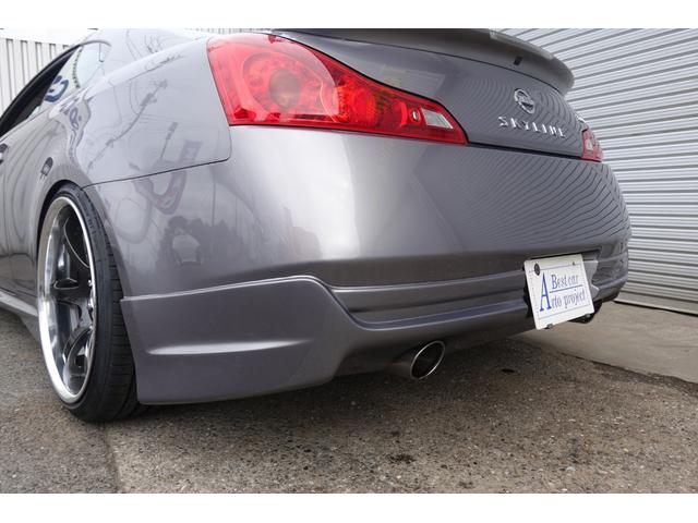 スカイライン 370GT タイプSP サンルーフ 6速マニュアル 新品ラッシュ車高調 SSR20インチ インパルサイドリアハーフエアロ 社外フロントリップ 純正OPトランクスポイラー(16枚目)