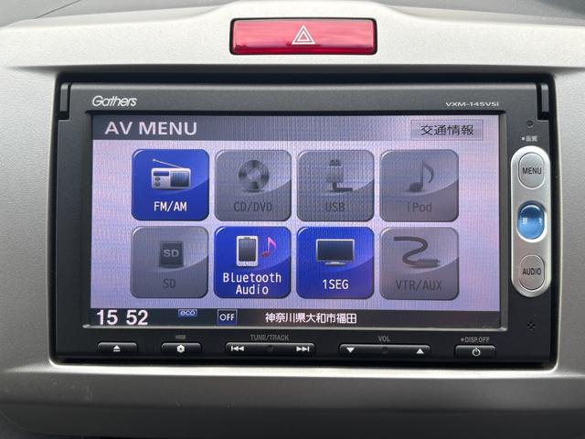 フリードハイブリッド ジャストセレクション　ナビテレビ　セキュリティー　横滑り防止機能　ＵＳＢ接続　記録簿　オートクルーズ　エアバック　ＤＶＤ再生可能　キーレスエントリー　ワンセグＴＶ　ＰＳ　ＥＴＣ　３列　ＡＢＳ（4枚目）