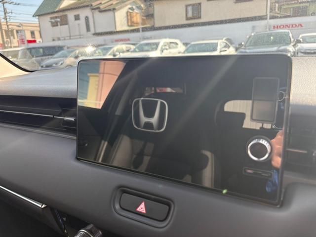 ヴェゼル e:HEVZ 1オーナー ドラレコ付き Rカメラ 記録簿 フルセグテレビ スマ-トキ- ETC車載器 アクティブクルーズ サイドエアバッグ ナビTV フルオートエアコン 横滑り防止 4WD車 ABS(2枚目)