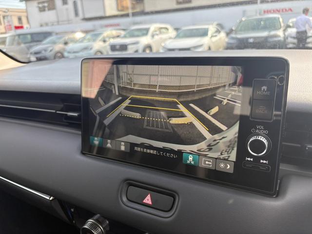 ヴェゼル e:HEVZ 1オーナー ドラレコ付き Rカメラ 記録簿 フルセグテレビ スマ-トキ- ETC車載器 アクティブクルーズ サイドエアバッグ ナビTV フルオートエアコン 横滑り防止 4WD車 ABS(3枚目)