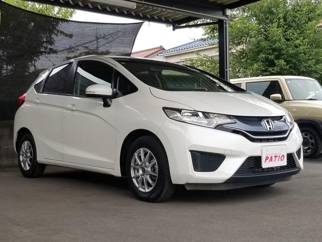 フィット 13G・Fパッケージ ナビ フルセグ Iストップ 14インチAW スマキー 禁煙車 フルフラット 横滑り防止 ABS 電格ミラー CD DVD再生 運転席エアバッグ 助手席エアバッグ エアコン パワーウィンドウ(14枚目)
