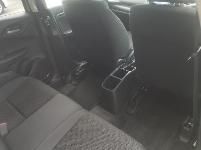 フィット 13G・Fパッケージ ナビ フルセグ Iストップ 14インチAW スマキー 禁煙車 フルフラット 横滑り防止 ABS 電格ミラー CD DVD再生 運転席エアバッグ 助手席エアバッグ エアコン パワーウィンドウ(26枚目)
