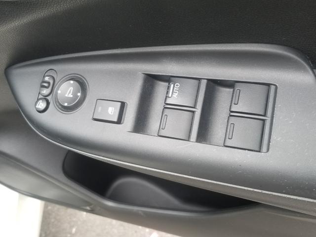 フィット 13G・Fパッケージ ナビ フルセグ Iストップ 14インチAW スマキー 禁煙車 フルフラット 横滑り防止 ABS 電格ミラー CD DVD再生 運転席エアバッグ 助手席エアバッグ エアコン パワーウィンドウ(40枚目)