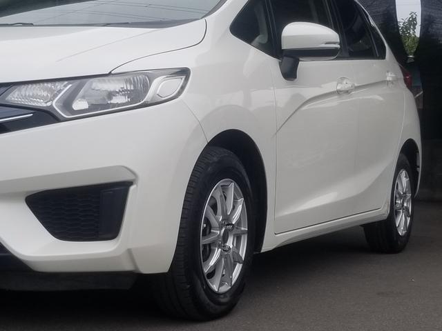 フィット 13G・Fパッケージ ナビ フルセグ Iストップ 14インチAW スマキー 禁煙車 フルフラット 横滑り防止 ABS 電格ミラー CD DVD再生 運転席エアバッグ 助手席エアバッグ エアコン パワーウィンドウ(52枚目)