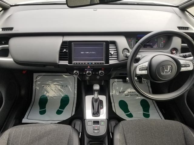 フィット e:HEVホーム 衝突軽減 レーンキープ 障害物センサー アダプティブクルーズ ナビ フルセグ Bカメラ Bluetoothオーディオ ETC LEDヘッドライト スマキー 禁煙車 フルフラット ABS(3枚目)