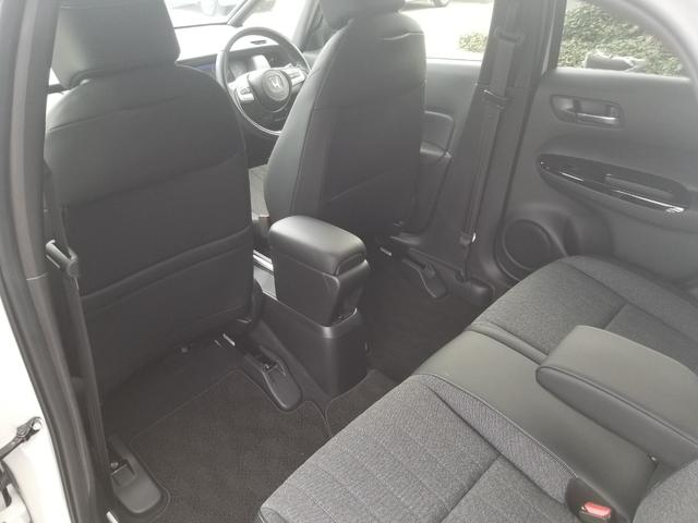 フィット e:HEVホーム 衝突軽減 レーンキープ 障害物センサー アダプティブクルーズ ナビ フルセグ Bカメラ Bluetoothオーディオ ETC LEDヘッドライト スマキー 禁煙車 フルフラット ABS(52枚目)