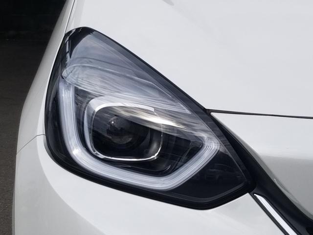 フィット e:HEVホーム 衝突軽減 レーンキープ 障害物センサー アダプティブクルーズ ナビ フルセグ Bカメラ Bluetoothオーディオ ETC LEDヘッドライト スマキー 禁煙車 フルフラット ABS(58枚目)