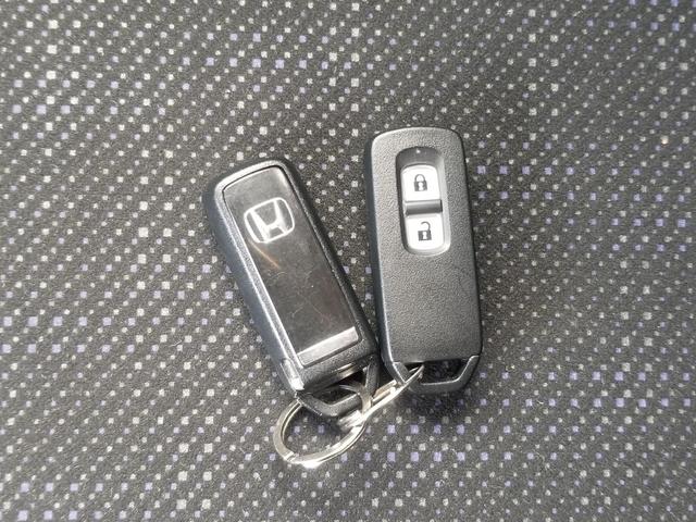 N-BOX G 4WD 両側スライド シートヒーター ナビ ワンセグ Iストップ スマキー 禁煙車 フルフラット ABS 電格ミラー ベンチシート CD 運転席エアバッグ 助手席エアバッグ エアコン パワーウィンドウ(18枚目)