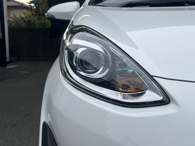 アクア L ナビ Bluetoothオーディオ ETC スマキー 禁煙車 ABS 電格ミラー 運転席エアバッグ 助手席エアバッグ エアコン パワーウィンドウ パワーステアリング(52枚目)