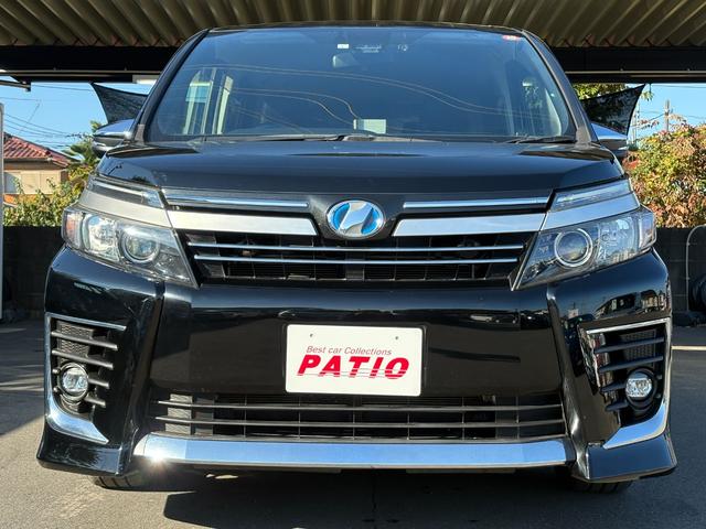 ヴォクシー ハイブリッドＺＳ　煌ＩＩ　衝突軽減　レーンキープ　両側電動　ナビ　フルセグ　Ｂカメラ　Ｂｌｕｅｔｏｏｔｈオーディオ　ＥＴＣ２．０　Ｉストップ　ＬＥＤヘッドライト　１６インチＡＷ　スマキー　記録簿　３列　フルフラット　ＡＢＳ（17枚目）