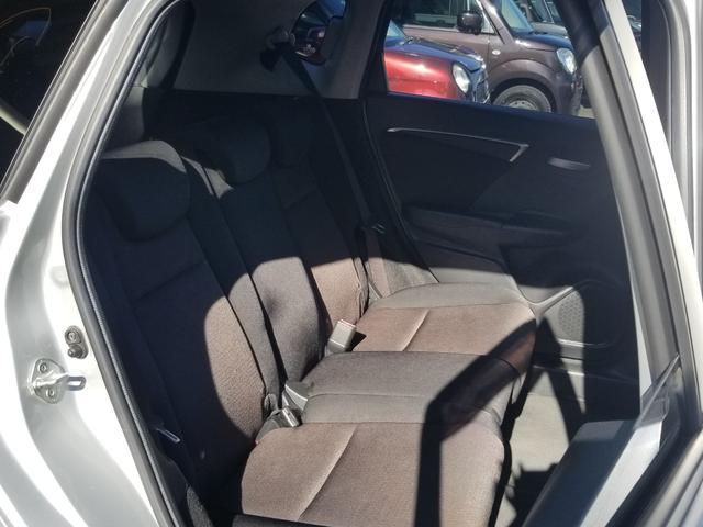 フィットハイブリッド Fパッケージ ナビ ワンセグ Bカメラ Bluetoothオーディオ ETC スマキー 禁煙車 フルフラット 横滑り防止 ABS 電格ミラー CD DVD再生 運転席エアバッグ 助手席エアバッグ エアコン(9枚目)