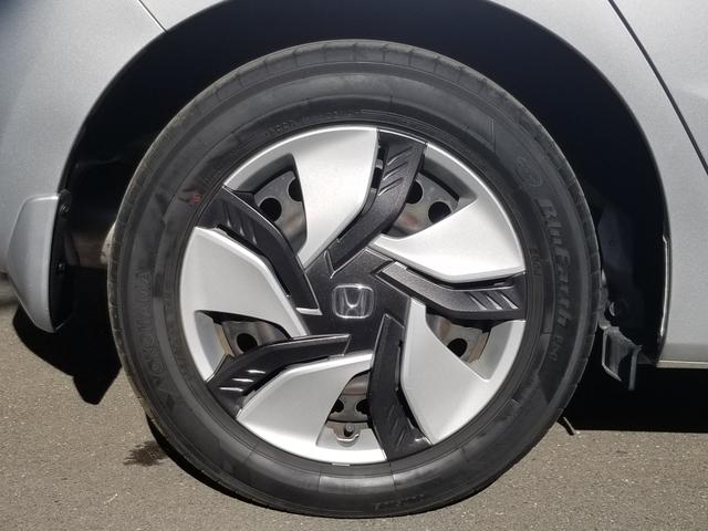 フィットハイブリッド Fパッケージ ナビ ワンセグ Bカメラ Bluetoothオーディオ ETC スマキー 禁煙車 フルフラット 横滑り防止 ABS 電格ミラー CD DVD再生 運転席エアバッグ 助手席エアバッグ エアコン(11枚目)