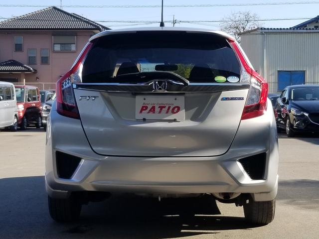 フィットハイブリッド Fパッケージ ナビ ワンセグ Bカメラ Bluetoothオーディオ ETC スマキー 禁煙車 フルフラット 横滑り防止 ABS 電格ミラー CD DVD再生 運転席エアバッグ 助手席エアバッグ エアコン(13枚目)