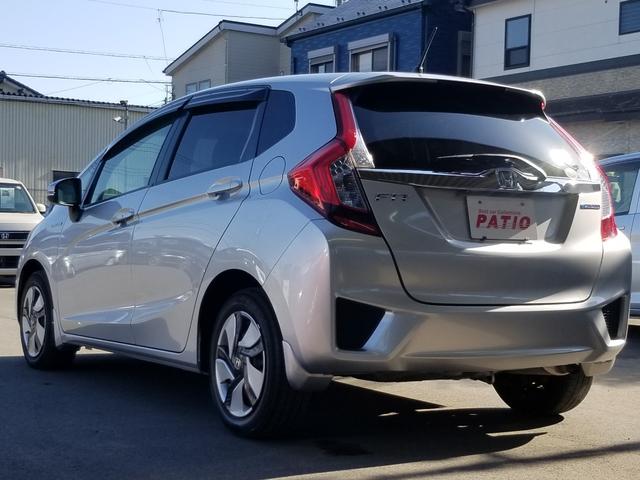 フィットハイブリッド Fパッケージ ナビ ワンセグ Bカメラ Bluetoothオーディオ ETC スマキー 禁煙車 フルフラット 横滑り防止 ABS 電格ミラー CD DVD再生 運転席エアバッグ 助手席エアバッグ エアコン(15枚目)