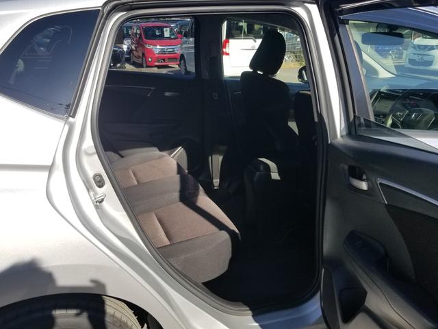 フィットハイブリッド Fパッケージ ナビ ワンセグ Bカメラ Bluetoothオーディオ ETC スマキー 禁煙車 フルフラット 横滑り防止 ABS 電格ミラー CD DVD再生 運転席エアバッグ 助手席エアバッグ エアコン(24枚目)