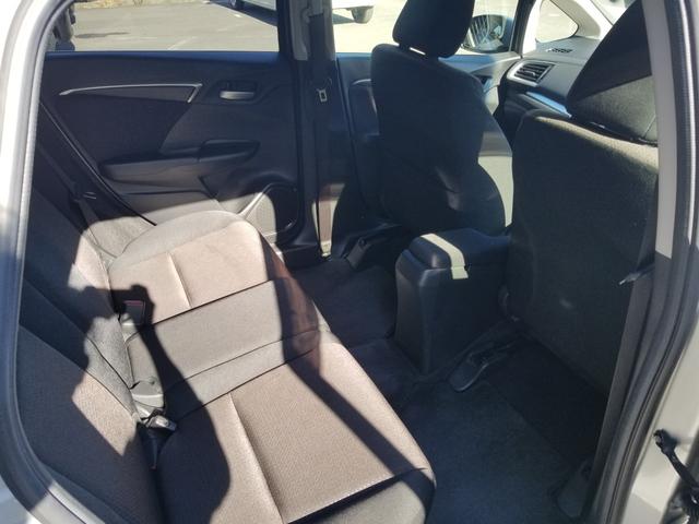 フィットハイブリッド Fパッケージ ナビ ワンセグ Bカメラ Bluetoothオーディオ ETC スマキー 禁煙車 フルフラット 横滑り防止 ABS 電格ミラー CD DVD再生 運転席エアバッグ 助手席エアバッグ エアコン(25枚目)