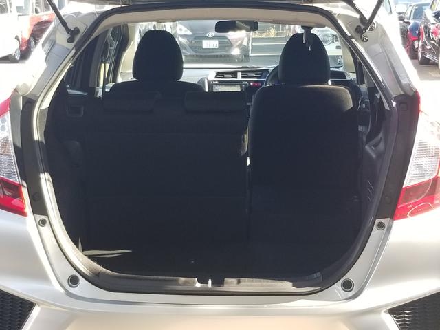 フィットハイブリッド Fパッケージ ナビ ワンセグ Bカメラ Bluetoothオーディオ ETC スマキー 禁煙車 フルフラット 横滑り防止 ABS 電格ミラー CD DVD再生 運転席エアバッグ 助手席エアバッグ エアコン(26枚目)