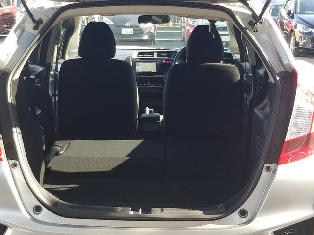 フィットハイブリッド Fパッケージ ナビ ワンセグ Bカメラ Bluetoothオーディオ ETC スマキー 禁煙車 フルフラット 横滑り防止 ABS 電格ミラー CD DVD再生 運転席エアバッグ 助手席エアバッグ エアコン(27枚目)